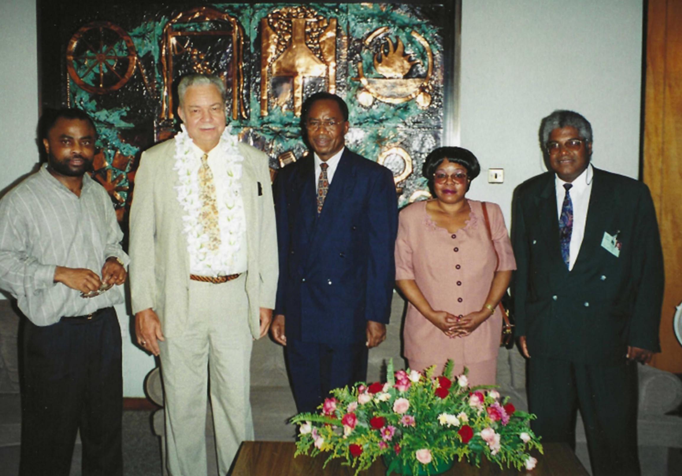 Basil and Dr, French welcomed by Drs. Musenger, Lambert and Health Ministry Rep. at Zambia Airport