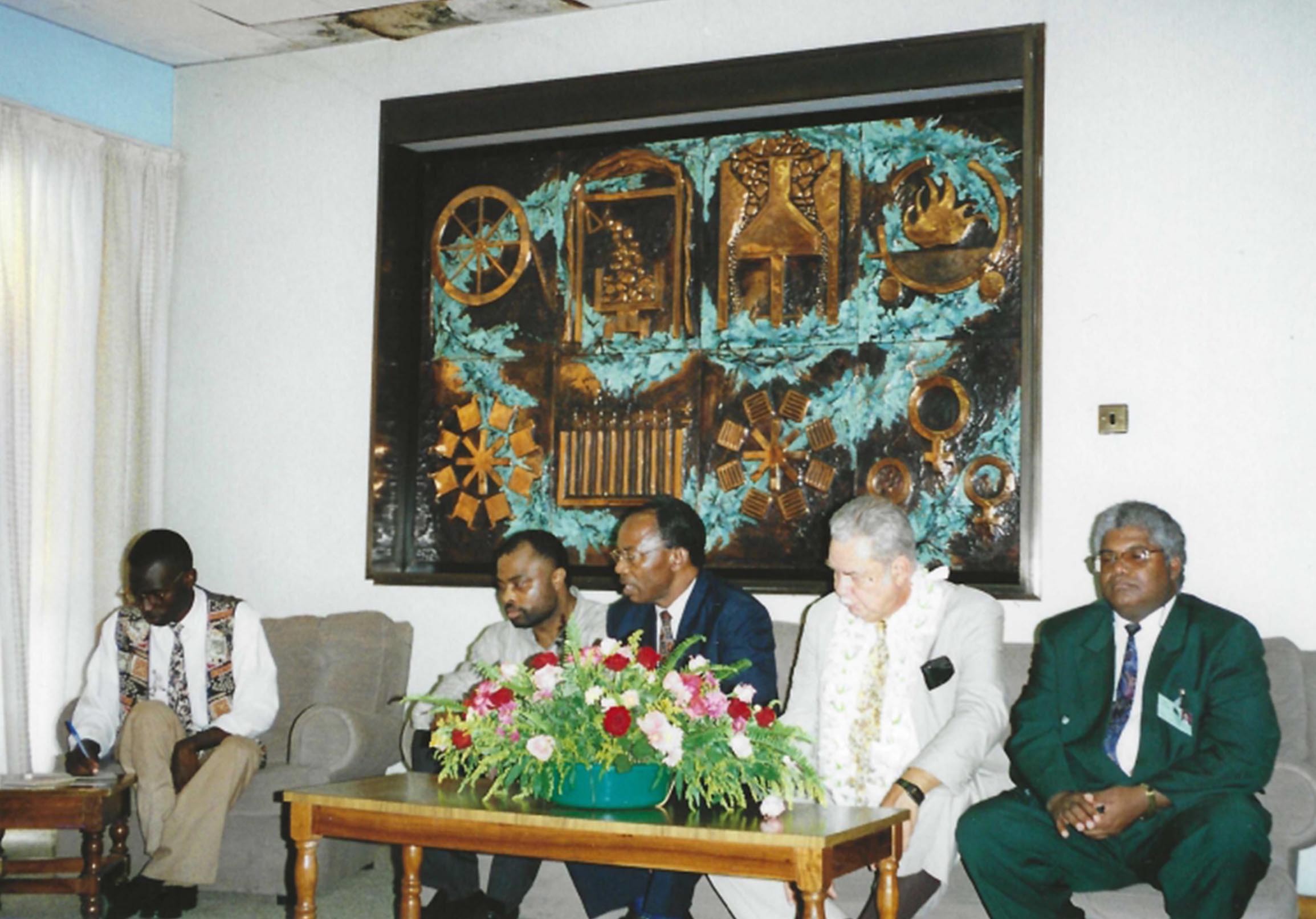 Dr. French and Basil Olisa Welcomed by Drs. Musenger and Lambert at the Zambia Airport in Lusaka